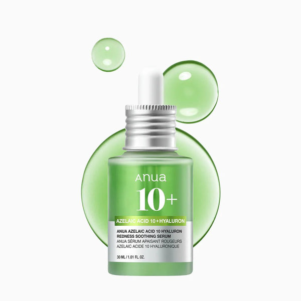 Anua 10+ serum bottle with green droplets on a white background
