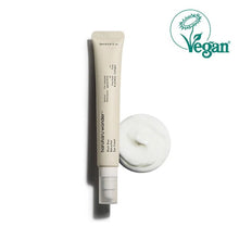 Eye cream tube with a swatch of cream on a white background, featuring the Vegan certification logo.