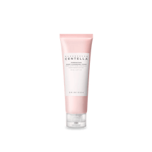 Skincare tube with pink and white design on a white background
