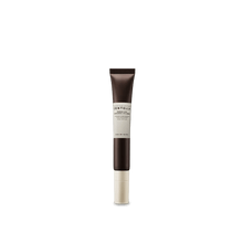 Skincare tube with a white label on a green background