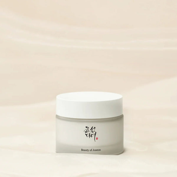 beauty of joseon dynasty cream Skincare jar with a white lid and beige body on a light beige background