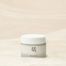 beauty of joseon dynasty cream Skincare jar with a white lid and beige body on a light beige background