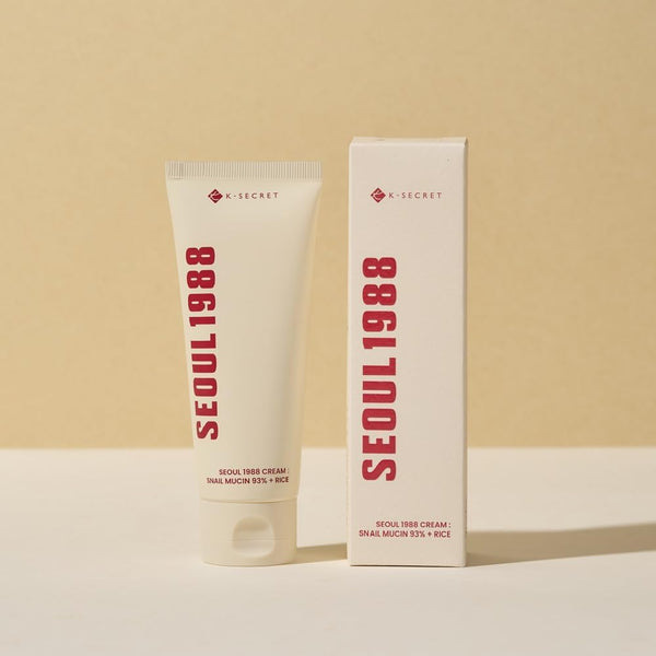 K-SECRET Seoul 1988 cream tube and box on a beige background